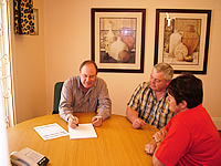 Eugene Ward meeting with clients